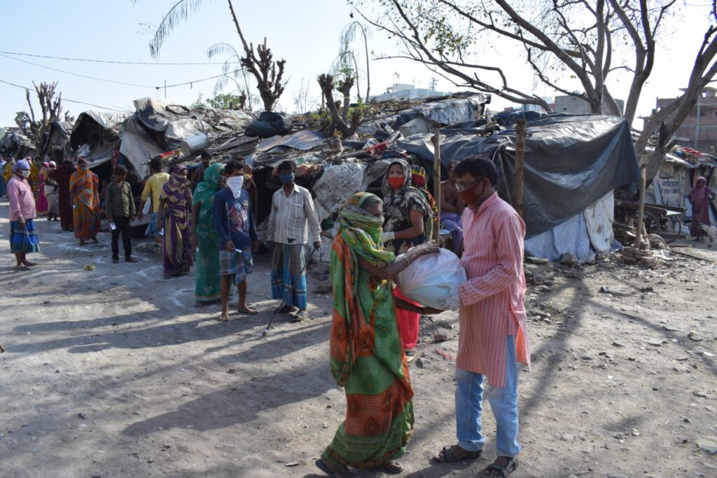 Semilla para el Cambio - reparto de comida slums