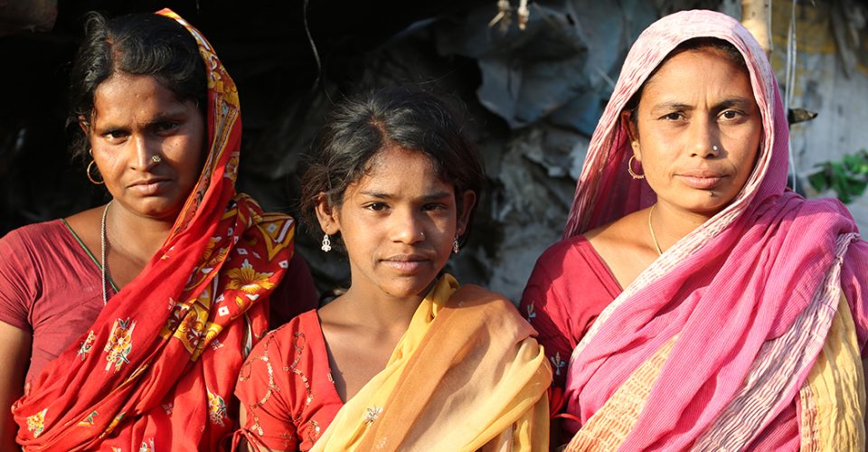 mujeres en los slums de sigra